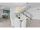 Modern dining area with white chairs and kitchen view at 3020 W Santiago St # 5, Tampa, FL 33629