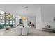 Circular dining table with modern chairs and kitchen access at 3020 W Santiago St # 5, Tampa, FL 33629
