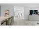 Open concept dining area with seating for four, offering an inviting space for meals at 3020 W Santiago St # 5, Tampa, FL 33629