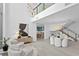 Open concept dining area with modern chandelier and kitchen view at 3020 W Santiago St # 5, Tampa, FL 33629