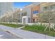 Modern townhouse exterior with landscaping and a private entrance at 3020 W Santiago St # 5, Tampa, FL 33629
