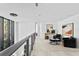 Bright hallway with modern art and a sitting area at 3020 W Santiago St # 5, Tampa, FL 33629