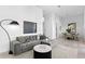 Spacious living area with sectional sofa and dining area at 3020 W Santiago St # 5, Tampa, FL 33629