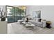 Spacious living room with sectional sofa and large windows at 3020 W Santiago St # 5, Tampa, FL 33629
