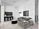 Relaxing living room with sectional sofa and large artwork at 3020 W Santiago St # 5, Tampa, FL 33629