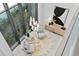 Cozy sitting area with two armchairs and large windows at 3020 W Santiago St # 5, Tampa, FL 33629