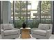Two armchairs and a table with a view at 3020 W Santiago St # 5, Tampa, FL 33629