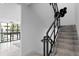 Modern staircase with metal railing and tiled steps at 3020 W Santiago St # 5, Tampa, FL 33629