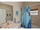 Simple bathroom with shower/tub combo and nautical theme at 311 Monaco Dr # 4, Punta Gorda, FL 33950