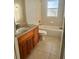 Clean bathroom with granite vanity and bathtub at 4015 Woodacre Ln, Tampa, FL 33624