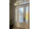 Elegant entryway with a glass door and sidelights at 4015 Woodacre Ln, Tampa, FL 33624