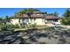 Two-story house with a large yard and attached garage at 4015 Woodacre Ln, Tampa, FL 33624