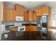 Spacious kitchen with wood cabinets and stainless steel appliances at 4015 Woodacre Ln, Tampa, FL 33624
