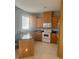 Kitchen with an island and stainless steel appliances at 4015 Woodacre Ln, Tampa, FL 33624