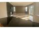 Bright living room with tile floors and access to a patio at 4015 Woodacre Ln, Tampa, FL 33624