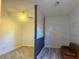 Versatile room with wood-look floors and a room divider at 4015 Woodacre Ln, Tampa, FL 33624