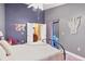 Bright bedroom with double bed, ensuite bathroom access, and private balcony at 4542 Park Lake N Ter # 4542, Bradenton, FL 34209