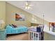 Upstairs bedroom with a twin bed and built-in workspace at 4542 Park Lake N Ter # 4542, Bradenton, FL 34209