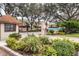 Gated community entrance with guard house and landscaping at 4542 Park Lake N Ter # 4542, Bradenton, FL 34209