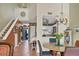 Dining area with a view into kitchen and living areas at 4542 Park Lake N Ter # 4542, Bradenton, FL 34209