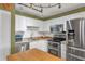 Updated kitchen with stainless steel appliances and an island at 4542 Park Lake N Ter # 4542, Bradenton, FL 34209
