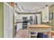 Modern kitchen with stainless steel appliances and white cabinets at 4542 Park Lake N Ter # 4542, Bradenton, FL 34209