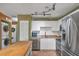 Eat-in kitchen with stainless steel appliances and ample counter space at 4542 Park Lake N Ter # 4542, Bradenton, FL 34209