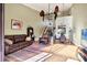 Open concept living room with high ceilings, view of kitchen and dining area at 4542 Park Lake N Ter # 4542, Bradenton, FL 34209