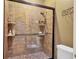 Large walk-in shower with tile surround and built-in shelves at 4542 Park Lake N Ter # 4542, Bradenton, FL 34209