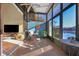 Spacious sunroom with plenty of natural light and view of the lake at 4542 Park Lake N Ter # 4542, Bradenton, FL 34209