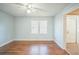 Spacious bedroom with hardwood floors and windows at 809 W Saunders St, Plant City, FL 33563