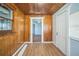 Sunroom with wood walls and new flooring at 809 W Saunders St, Plant City, FL 33563