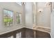 Spacious dining area with hardwood floors and natural light at 8831 Garden Party Dr, Land O Lakes, FL 34637