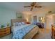 Large main bedroom with a comfortable king-size bed at 9815 47Th N Ave # 202, St Petersburg, FL 33708