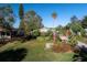 Charming single story home with a lush front yard at 10649 Blossom Lake Dr, Seminole, FL 33772