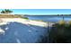 Private beach access with lake views and lounge chairs at 12108 Blue Pacific Dr, Riverview, FL 33579