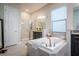 Elegant bathroom featuring a soaking tub and walk-in shower at 13423 White Sapphire Rd, Riverview, FL 33579