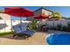 Enjoy this luxurious patio furniture by the pool at 13423 White Sapphire Rd, Riverview, FL 33579