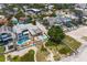 Aerial view of beach house with pool and ocean view at 1600 Beach Trl, Indian Rocks Beach, FL 33785