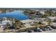 Aerial view of waterfront home with boat slips and access to the marina at 17163 2Nd E St, North Redington Beach, FL 33708