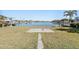 Spacious backyard with water access and a large concrete pad at 17163 2Nd E St, North Redington Beach, FL 33708