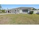 Single story home with attached garage and manicured lawn at 17163 2Nd E St, North Redington Beach, FL 33708