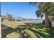 Peaceful waterfront lot with mature palm trees at 17163 2Nd E St, North Redington Beach, FL 33708