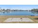 Serene waterfront view with grassy area and boat slips at 17163 2Nd E St, North Redington Beach, FL 33708