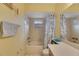 Bathroom with shower/tub combo, vanity, and mirror at 2211 Whitney Pl, Valrico, FL 33594