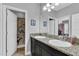 bathroom with double vanity and shower/tub combo at 2847 Calvano Dr, Land O Lakes, FL 34639