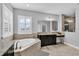 Large bathroom with soaking tub, double vanity, and shower at 2847 Calvano Dr, Land O Lakes, FL 34639