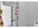 Bathroom with shower and door to another room at 2847 Calvano Dr, Land O Lakes, FL 34639