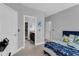 Well-lit bedroom with access to a private bathroom at 2847 Calvano Dr, Land O Lakes, FL 34639
