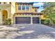 Two-car garage with a brick paved driveway at 2847 Calvano Dr, Land O Lakes, FL 34639